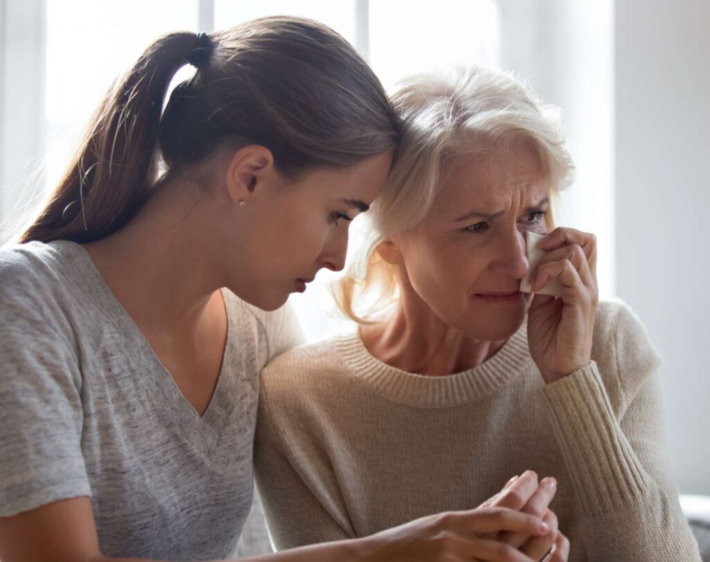 A photo of an upset family that are struggling financially.